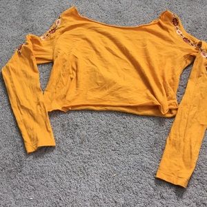 Cropped long sleeve with shoulder cutouts